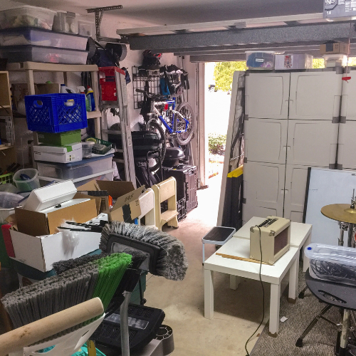 Cluttered garage before